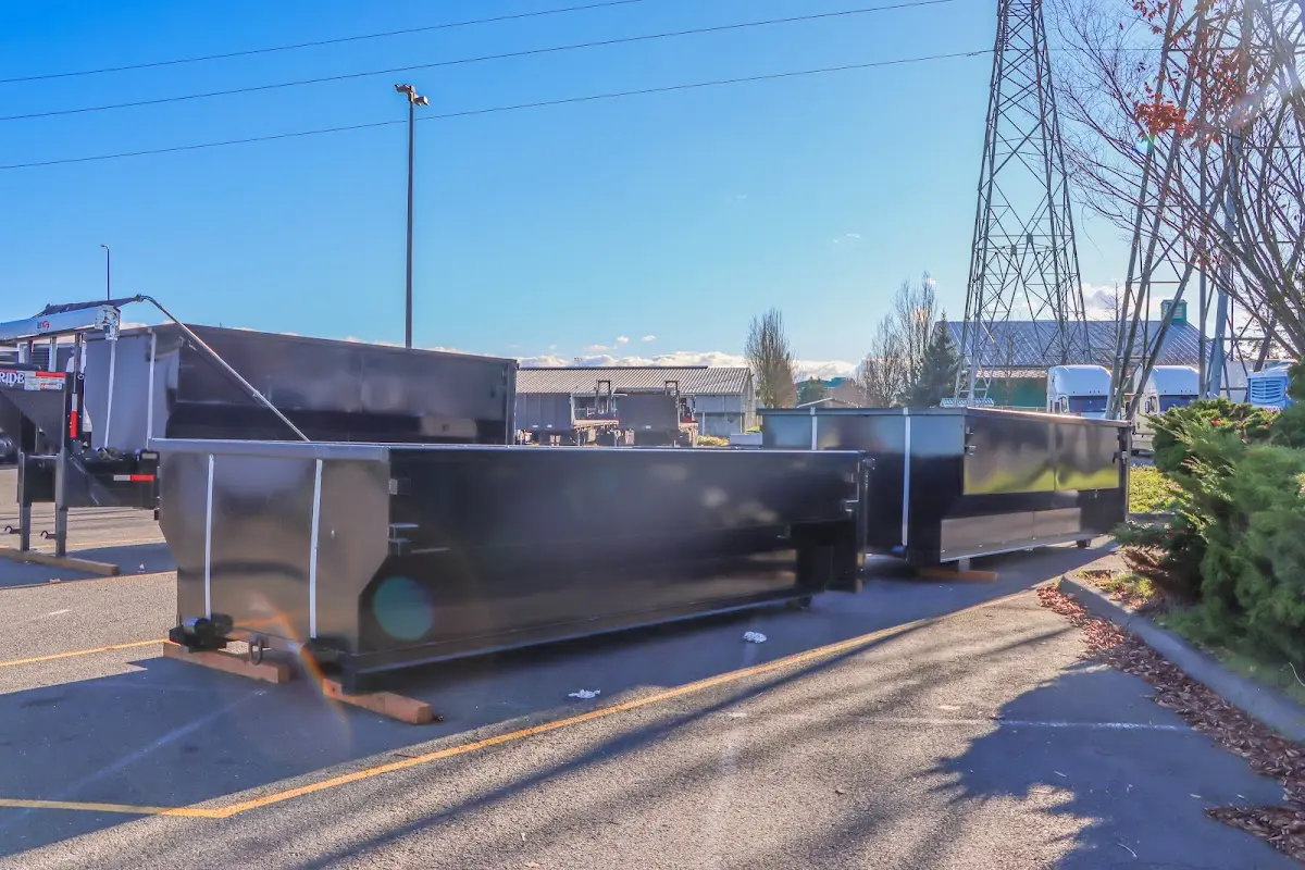 Roll-off dumpster ready for waste disposal at job site for 12 Yard Dumpster Rental in Silver Lake